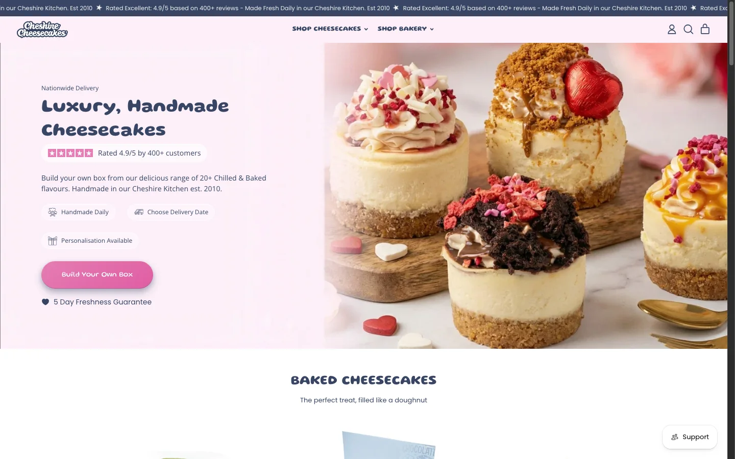 The Cheshire Cheesecakes storefront, showing the build-your-own-box ordering route on the home page.